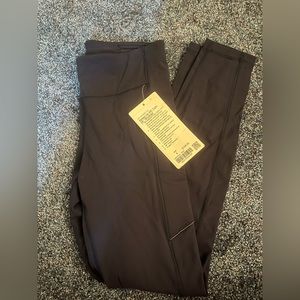 Lulu navy speed up brushed leggings size 6